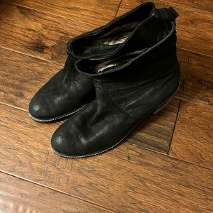 Heeled black pull on short boot